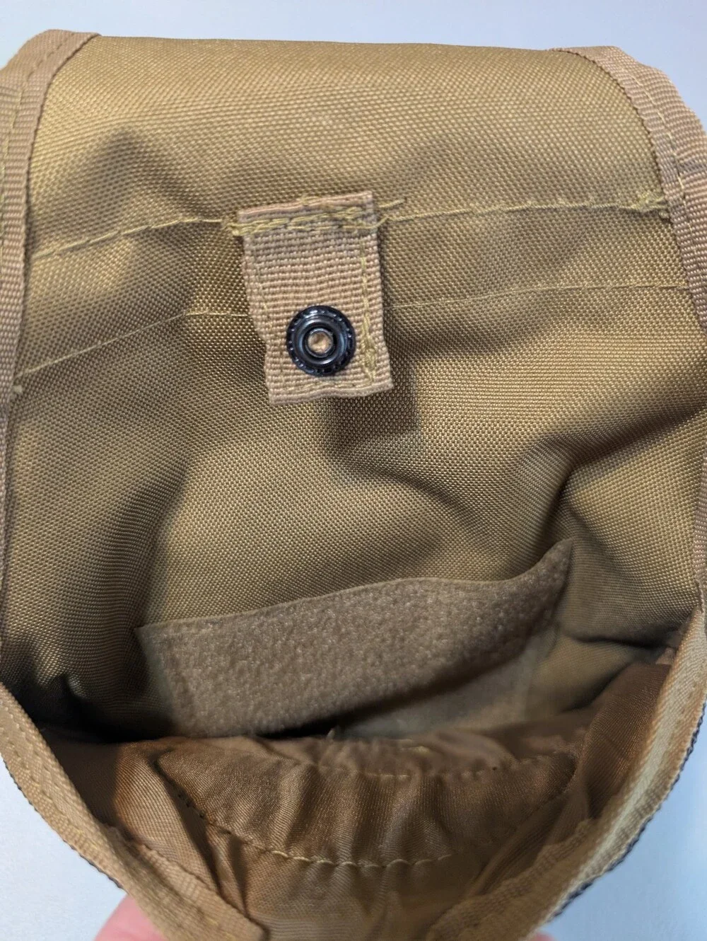New tan tactical sling pack with holster